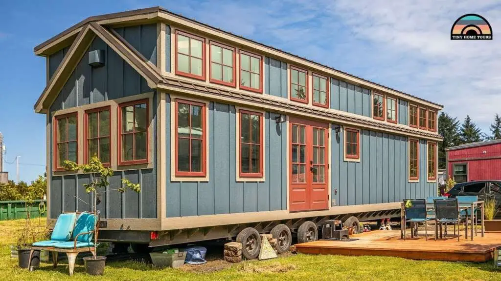 Storage and high ceilings in the main bedroom of Janis and Glens tiny house